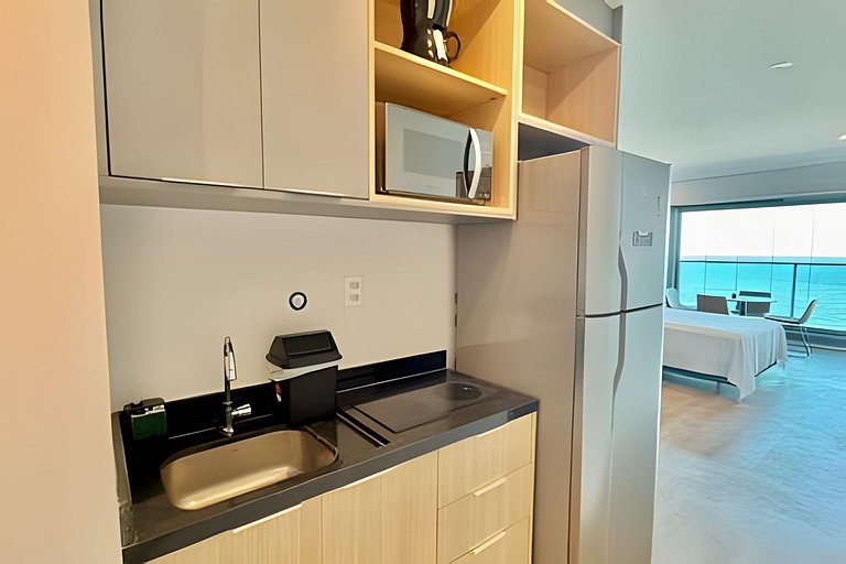 Lindo studio com vista mar